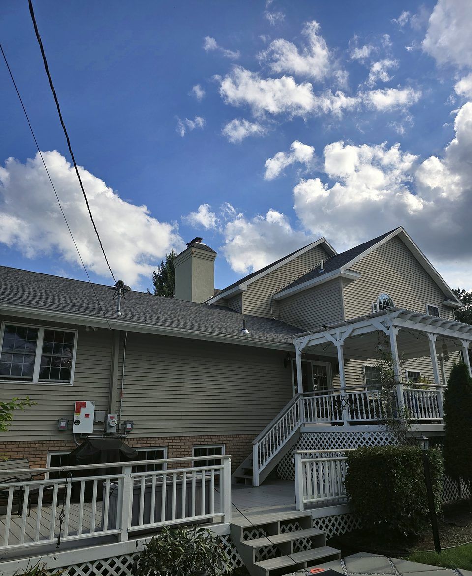 Residence, Niskayuna - Chimney stucco assessment and repair, 2026.